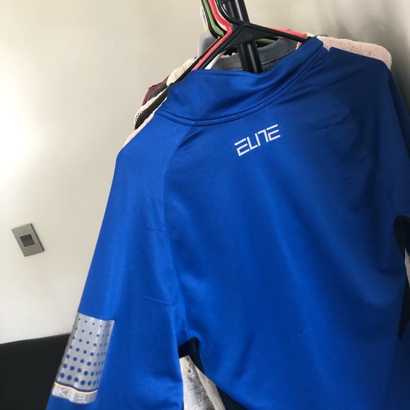 A blue Nike long sleeve quarter zip up. - Picture 2 of 3